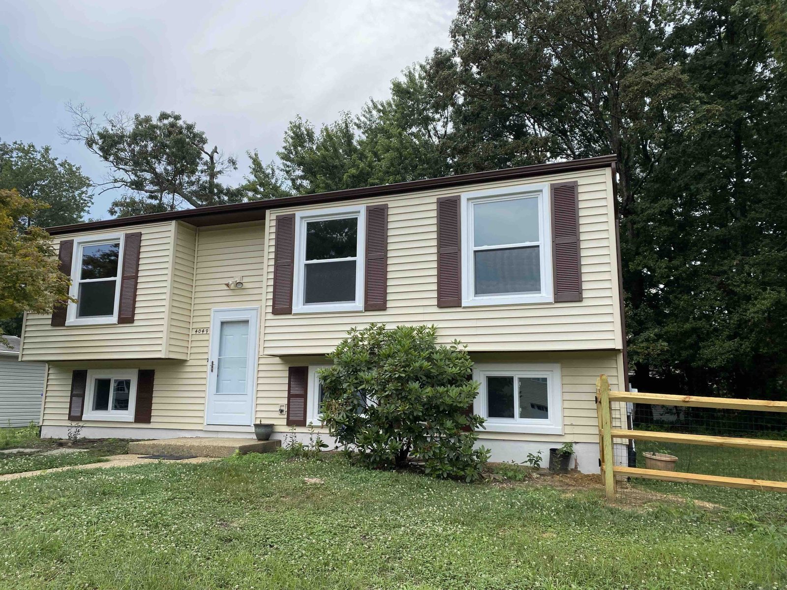 Exterior of remodeled home with new windows installed by Smart General Contractors